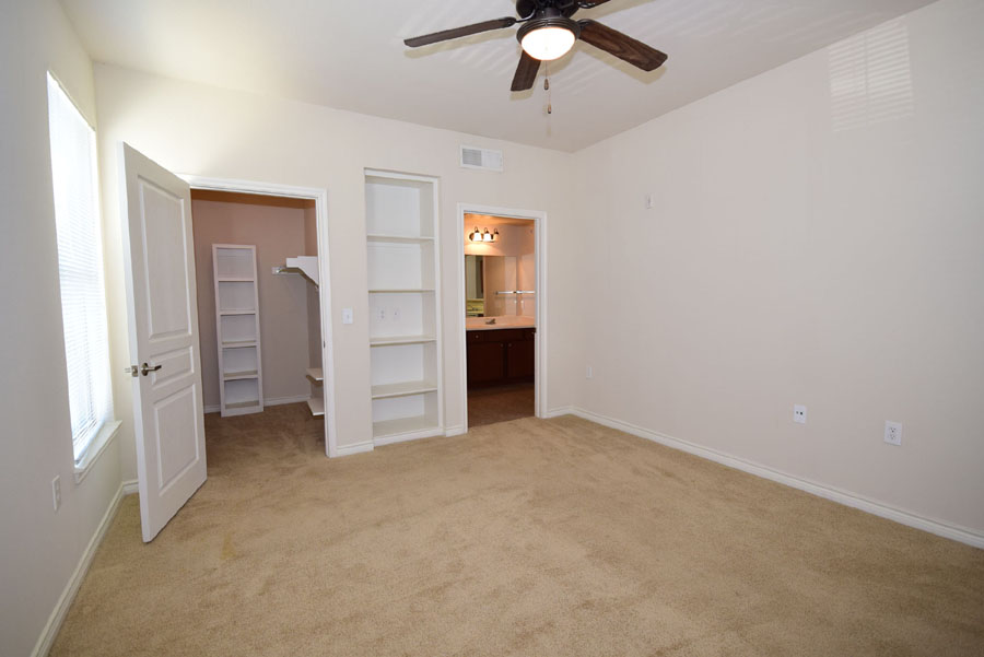 Bedroom with walk-in closet at Villas on Calloway Creek